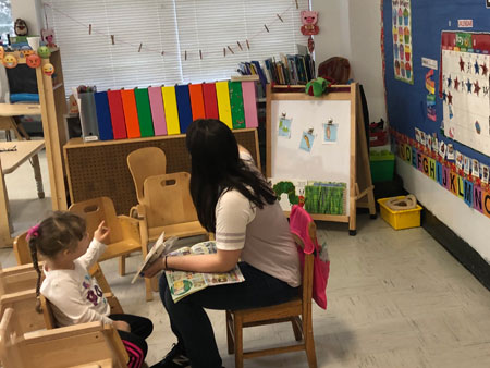 East River CDC teacher and student